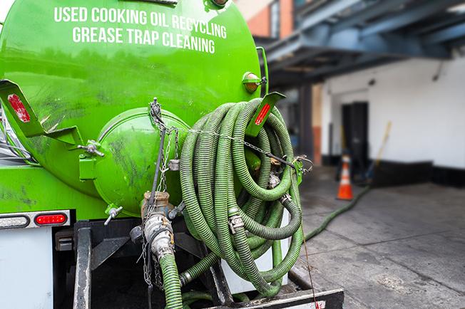 Grease Trap Cleaning of Royal Oak workers